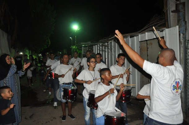  بالصور: سرية كشاف النادي الاسلامي تُنظم استعراضاً كشفياً احتفالاً بشهر رمضان المبارك 